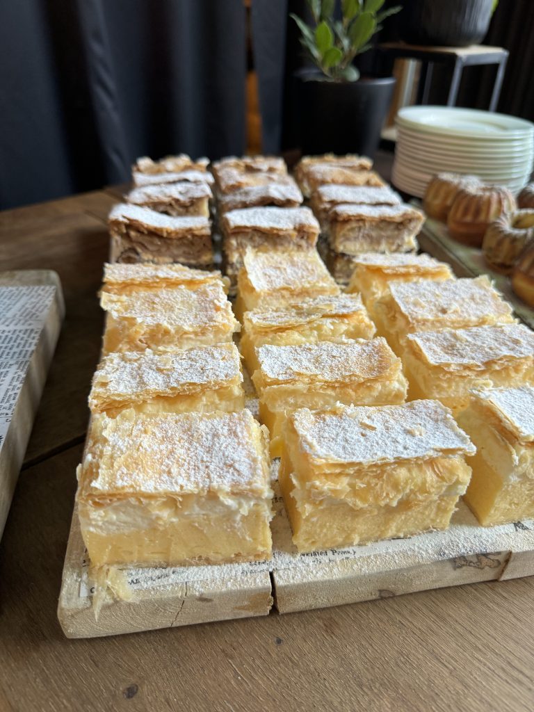 Cream cake served on a board 